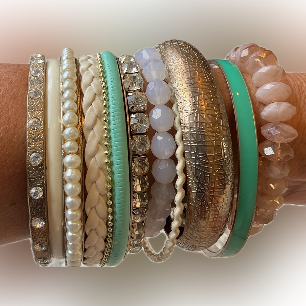 Lot of random gold tone bracelets